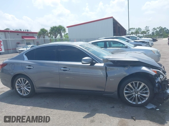 2020 Infiniti Q50 Pure with VIN JN1EV7APXLM208317, listed as a IAAI auction lot 39446112 with 34,846 mi miles and . Bid and sale history available at carsss.com. Image 14.