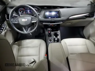 2022 Cadillac XT4 AWD Luxury with VIN 1GYFZBR45NF145986, listed as a Copart auction lot 79198274 with 23,477 mi miles and Salvage Title. Bid and sale history available at carsss.com. Image 8.