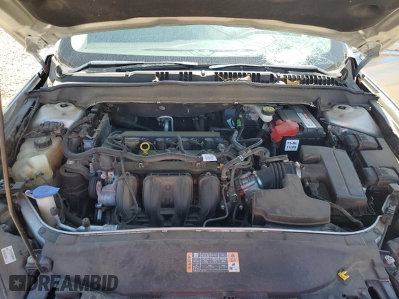 2015 Ford Fusion SE z VIN 3FA6P0H70FR265071, wystawiony jako Copart lot #55843685 z przebiegiem 137 104 mil mil oraz Szkoda całkowita • Salvage title. Historia ofert i sprzedaży dostępna na DreamBid. Obrazek 11.