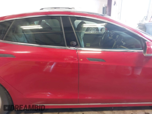 2016 Tesla Model S 90D with VIN 5YJSA1E24GF141543, listed as a IAAI auction lot 42045333 with Not Provided miles and . Bid and sale history available at DreamBid. Image 13.