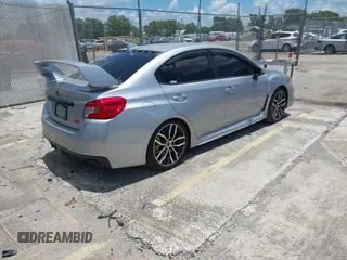 2021 Subaru WRX STI with VIN JF1VA2E66M9822014, listed as a IAAI auction lot 42499316 with 55,625 mi miles and . Bid and sale history available at DreamBid. Image 4.