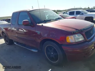 2003 Ford F-150 Heritage XL with VIN 2FTRX17W83CB02047, listed as a IAAI auction lot 41738945 with 1 mi miles. Bid and sale history available at carsss.com. Image 1.