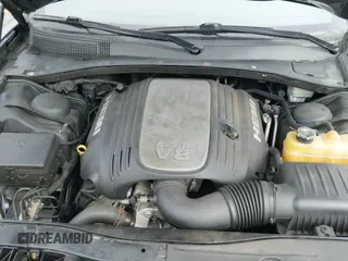 2013 Dodge Charger RT z VIN 2C3CDXCT8DH676914, wystawiony jako IAAI lot #41653738 z przebiegiem 159 654 mil mil oraz . Historia ofert i sprzedaży dostępna na DreamBid. Obrazek 19.