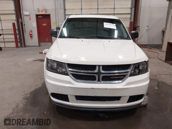 2015 Dodge Journey American Value z VIN 3C4PDCAB4FT714200, wystawiony jako IAAI lot #42199910 z przebiegiem 205 009 mil mil oraz . Historia ofert i sprzedaży dostępna na DreamBid. Obrazek 12.