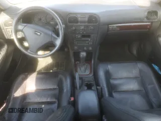2004 Volvo V40 z VIN YV1VW27564F038086, wystawiony jako Copart lot #69464094 z przebiegiem 223 544 mil mil oraz Tytuł czysty. Historia ofert i sprzedaży dostępna na DreamBid. Obrazek 8.