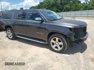 2015 Chevrolet Suburban LTZ with VIN 1GNSCKKC7FR552173, listed as a Copart auction lot 63483995 with 250,564 mi miles and Salvage title. Bid and sale history available at DreamBid. Image 4.