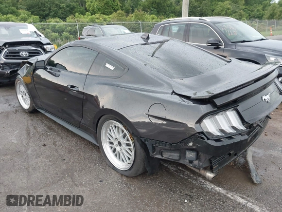 2022 Ford Mustang EcoBoost with VIN 1FA6P8TH2N5113664, listed as a IAAI auction lot 42314252 with 55,130 mi miles and . Bid and sale history available at DreamBid. Image 3.