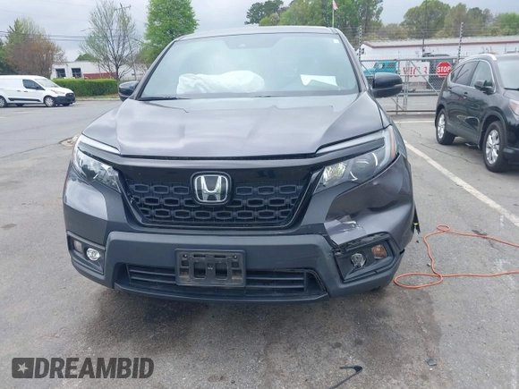 2020 Honda Passport EX-L z VIN 5FNYF8H5XLB018060, wystawiony jako IAAI lot #41961243 z przebiegiem 60 575 mil mil oraz . Historia ofert i sprzedaży dostępna na DreamBid. Obrazek 12.