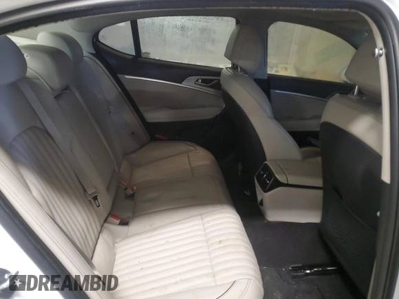 2021 Genesis G70 2.0T z VIN KMTG34LA4MU072420, wystawiony jako Copart lot #87259094 z przebiegiem 36 491 mil mil oraz Szkoda całkowita • Salvage title. Historia ofert i sprzedaży dostępna na DreamBid. Obrazek 10.