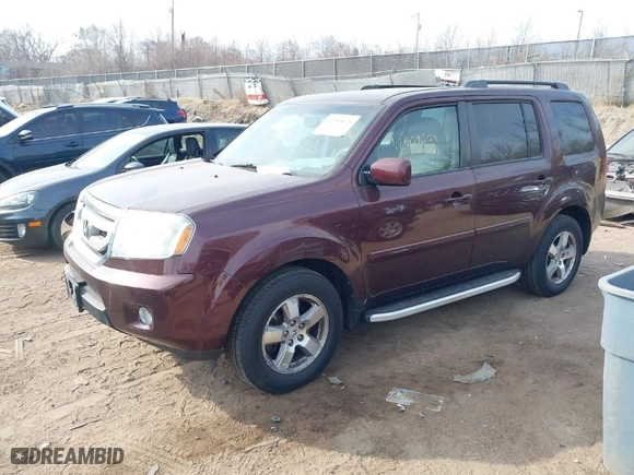 2011 Honda Pilot EX-L with VIN 5FNYF4H52BB004337, listed as a IAAI auction lot 41909673 with 153,966 mi miles. Bid and sale history available at carsss.com. Image 2.