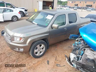 2010 Honda Ridgeline RTL with VIN 5FPYK1F50AB003576, listed as a IAAI auction lot 42050763 with 183,197 mi miles. Bid and sale history available at carsss.com. Image 2.