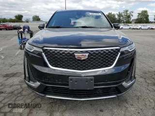 2023 Cadillac XT6 FWD Premium Luxury with VIN 1GYKPCRS5PZ220616, listed as a Copart auction lot 56913725 with 25,860 mi miles and Salvage title. Bid and sale history available at DreamBid. Image 5.