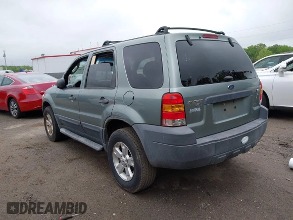 2007 Ford Escape XLT with VIN 1FMCU03137KA12966, listed as a IAAI auction lot 42191156 with 180,000 mi miles and . Bid and sale history available at DreamBid. Image 3.