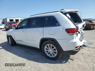 2022 Jeep Grand Cherokee Laredo X with VIN 1C4RJEAG1NC155952, listed as a Copart auction lot 52170235 with 74,695 mi miles and Salvage title. Bid and sale history available at DreamBid. Image 2.