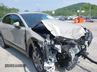2024 Mazda CX-30 S Premium with VIN 3MVDMBDMXRM615226, listed as a IAAI auction lot 42426451 with 3,461 mi miles and . Bid and sale history available at DreamBid. Image 1.