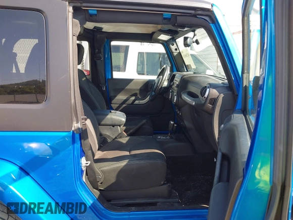 2016 Jeep Wrangler Sahara with VIN 1C4AJWBG9GL112139, listed as a IAAI auction lot 40286816 with 54,568 mi miles and . Bid and sale history available at DreamBid. Image 5.