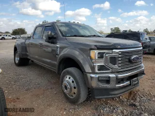 2021 Ford Super Duty F-450 DRW XL with VIN 1FT8W4DT8MED70361, listed as a Copart auction lot 77518704 with 216,040 mi miles and Salvage Title. Bid and sale history available at carsss.com. Image 4.