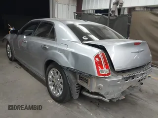 2013 Chrysler 300 with VIN 2C3CCAEG4DH691524, listed as a IAAI auction lot 41890003 with 92,228 mi miles. Bid and sale history available at carsss.com. Image 3.
