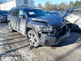 2021 GMC Acadia SLE with VIN 1GKKNRLS9MZ100776, listed as a IAAI auction lot 41384075 with 47,304 mi miles. Bid and sale history available at carsss.com. Image 1.