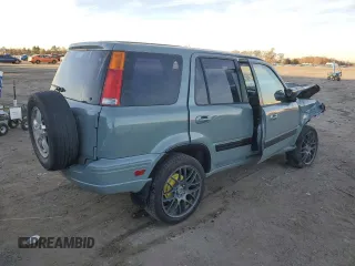 2000 Honda CR-V EX with VIN JHLRD1863YC006639, listed as a Copart auction lot 80442254 with 200,218 mi miles and Salvage Title. Bid and sale history available at carsss.com. Image 3.