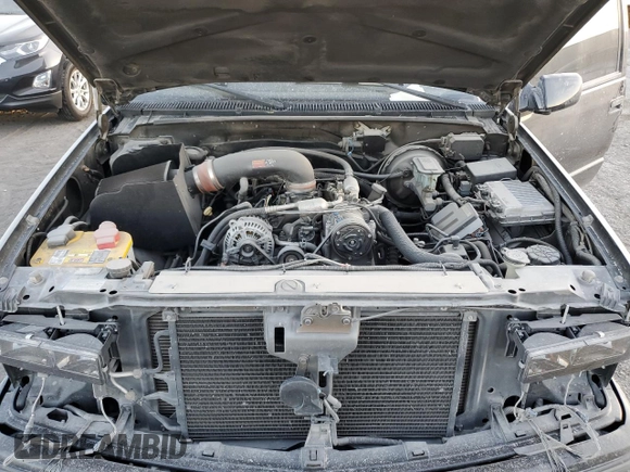 1999 Chevrolet Tahoe with VIN 3GNEC18R1XG143882, listed as a Copart auction lot 42177005 with 130,368 mi miles and Salvage title. Bid and sale history available at DreamBid. Image 12.