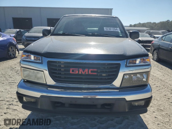2010 GMC Canyon SLE1 with VIN 1GTJTCDE6A8113828, listed as a Copart auction lot 82361354 with 212,101 mi miles and Salvage Title. Bid and sale history available at carsss.com. Image 5.