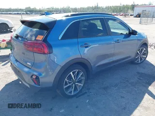 2021 Kia Niro Touring with VIN KNDCC3LC3M5483455, listed as a IAAI auction lot 41678795 with 132,216 mi miles. Bid and sale history available at carsss.com. Image 4.