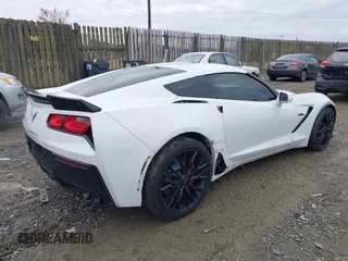 2014 Chevrolet Corvette 1LT z VIN 1G1YA2D7XE5128719, wystawiony jako IAAI lot #40877448 z przebiegiem 75 961 mil mil oraz . Historia ofert i sprzedaży dostępna na DreamBid. Obrazek 4.