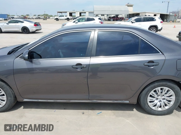 2014 Toyota Camry L with VIN 4T4BF1FKXER379158, listed as a IAAI auction lot 42050926 with 88,060 mi miles and . Bid and sale history available at DreamBid. Image 14.
