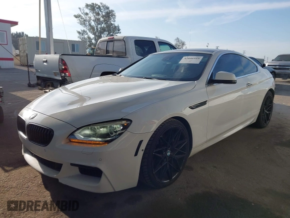 2012 BMW 6 Series 650i with VIN WBALX3C52CC528401, listed as a IAAI auction lot 42046910 with 105,844 mi miles. Bid and sale history available at carsss.com. Image 19.