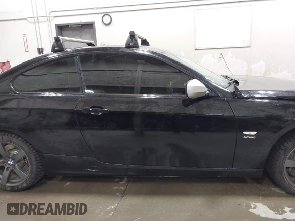 2011 BMW 3 Series 335i xDrive with VIN WBAKF9C53BE247177, listed as a IAAI auction lot 41973181 with 113,986 mi miles. Bid and sale history available at carsss.com. Image 13.