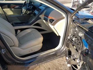 2015 Lincoln MKZ Hybrid with VIN 3LN6L2LU3FR624116, listed as a IAAI auction lot 41697007 with 59,083 mi miles. Bid and sale history available at carsss.com. Image 5.