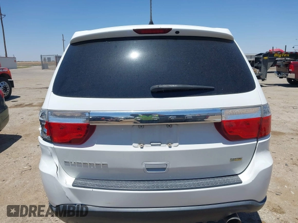 2013 Dodge Durango SXT with VIN 1C4RDHAG0DC696904, listed as a IAAI auction lot 42310831 with 112,964 mi miles and . Bid and sale history available at DreamBid. Image 17.