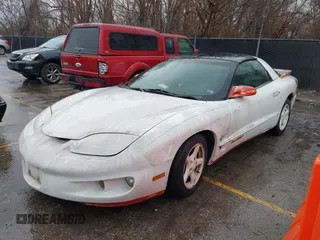 1998 Pontiac Firebird with VIN 2G2FS22KXW2207523, listed as a IAAI auction lot 41714591 with 151,321 mi miles. Bid and sale history available at carsss.com. Image 2.