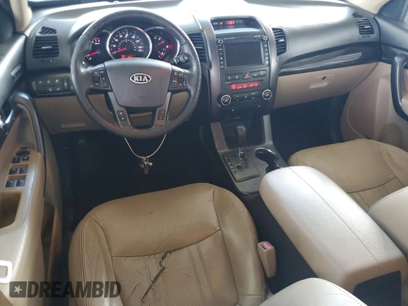 2012 Kia Sorento EX с VIN 5XYKU4A64CG261606, выставлен на аукционе Copart как лот 60863835 с пробегом 196 380 миль миль и Списание • Salvage title. История ставок и продаж доступна на DreamBid. Изображение 8.
