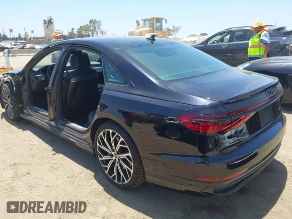 2024 Audi A8 with VIN WAULDAF89RN003075, listed as a IAAI auction lot 42502959 with 4,409 mi miles and . Bid and sale history available at DreamBid. Image 3.