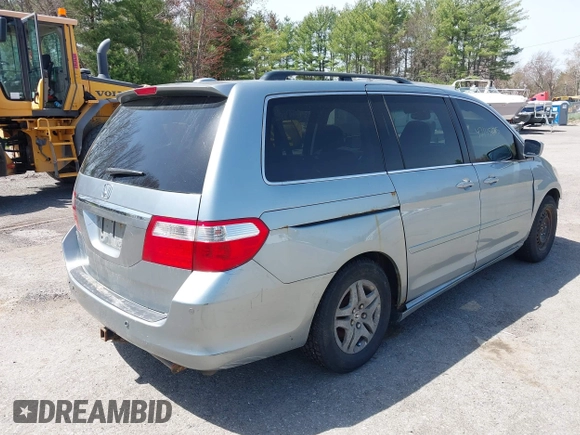 2007 Honda Odyssey Touring with VIN 5FNRL38867B122822, listed as a IAAI auction lot 42145685 with 212,164 mi miles. Bid and sale history available at carsss.com. Image 4.