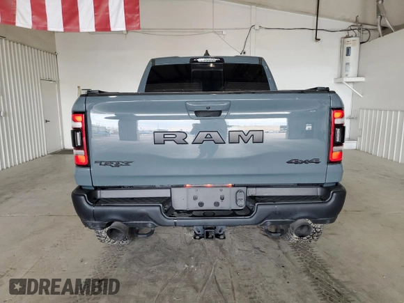 2021 Ram 1500 with VIN 0K1905786880, listed as a Copart auction lot 61756114 with 34,927 mi miles and Clean title. Bid and sale history available at DreamBid. Image 6.