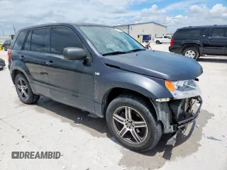 2008 Suzuki Grand Vitara with VIN JS3TE941284104419, listed as a Copart auction lot 63089375 with 216,057 mi miles and Salvage title. Bid and sale history available at DreamBid. Image 4.