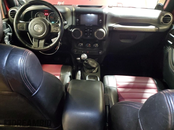 2012 Jeep Wrangler Unlimited Sport z VIN 1C4BJWDG8CL282181, wystawiony jako Copart lot #53863375 z przebiegiem 92 984 mil mil oraz Szkoda całkowita • Salvage title. Historia ofert i sprzedaży dostępna na DreamBid. Obrazek 8.