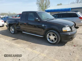 2000 Ford F-150 XL with VIN 2FTRX07L6YCA93968, listed as a Copart auction lot 52541195 with 252,092 mi miles and Salvage title. Bid and sale history available at DreamBid. Image 4.