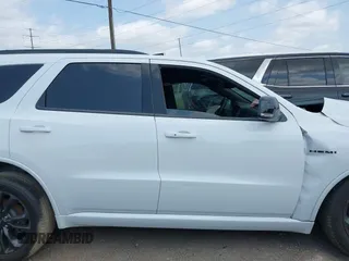 2023 Dodge Durango R/T Plus with VIN 1C4SDHCT7PC686970, listed as a IAAI auction lot 42156304 with 14,592 mi miles and . Bid and sale history available at DreamBid. Image 13.
