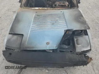 1986 Toyota MR2 z VIN JT2AW15CXG0066425, wystawiony jako Copart lot #74560234 z przebiegiem Nie podano mil oraz Nie do naprawy. Historia ofert i sprzedaży dostępna na DreamBid. Obrazek 11.