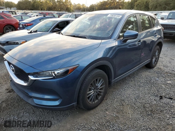 2017 Mazda CX-5 Sport with VIN JM3KFABL4H0124781, listed as a Copart auction lot 73826154 with 126,867 mi miles and Non Repairable. Bid and sale history available at carsss.com. Image 1.