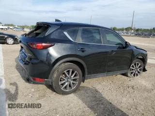 2021 Mazda CX-5 Sport with VIN JM3KFABM9M0301909, listed as a Copart auction lot 52188175 with 73,607 mi miles and Non Repairable. Bid and sale history available at carsss.com. Image 3.
