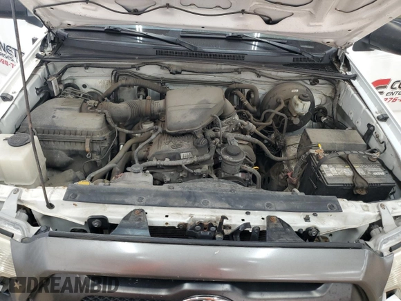 2014 Toyota Tacoma with VIN 5TFNX4CNXEX041332, listed as a Copart auction lot 56026455 with 151,947 mi miles and Salvage title. Bid and sale history available at DreamBid. Image 11.