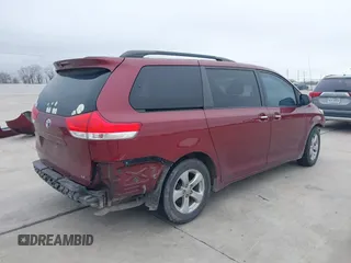 2014 Toyota Sienna LE AAS with VIN 5TDKK3DC6ES487962, listed as a IAAI auction lot 41568458 with 164,043 mi miles. Bid and sale history available at carsss.com. Image 4.