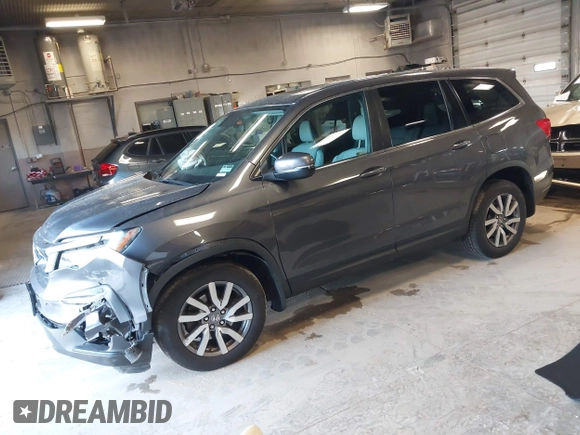 2019 Honda Pilot EX-L with VIN 5FNYF6H50KB035548, listed as a IAAI auction lot 42011724 with 105,195 mi miles and . Bid and sale history available at DreamBid. Image 2.