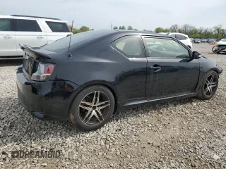 2014 Scion tC z VIN JTKJF5C76E3070903, wystawiony jako Copart lot #54953665 z przebiegiem 77 850 mil mil oraz Szkody całkowita. Historia ofert i sprzedaży dostępna na DreamBid. Obrazek 3.