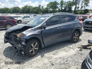 2018 Toyota RAV4 XLE with VIN JTMWFREV6JD121563, listed as a Copart auction lot 63162155 with 68,578 mi miles and Salvage title. Bid and sale history available at DreamBid. Image 1.